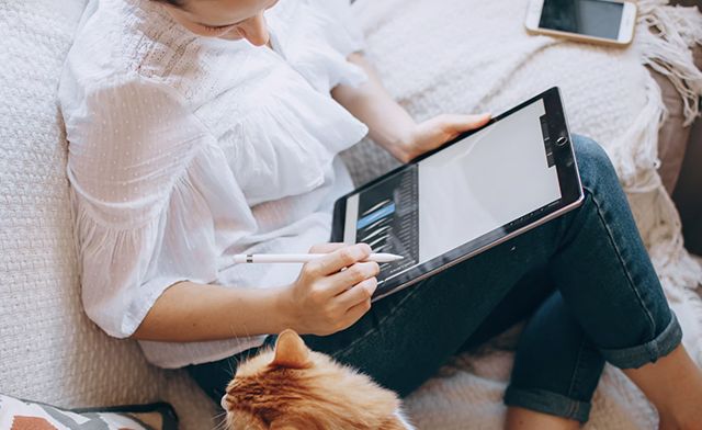 woman working at home online