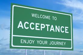 street sign about acceptance